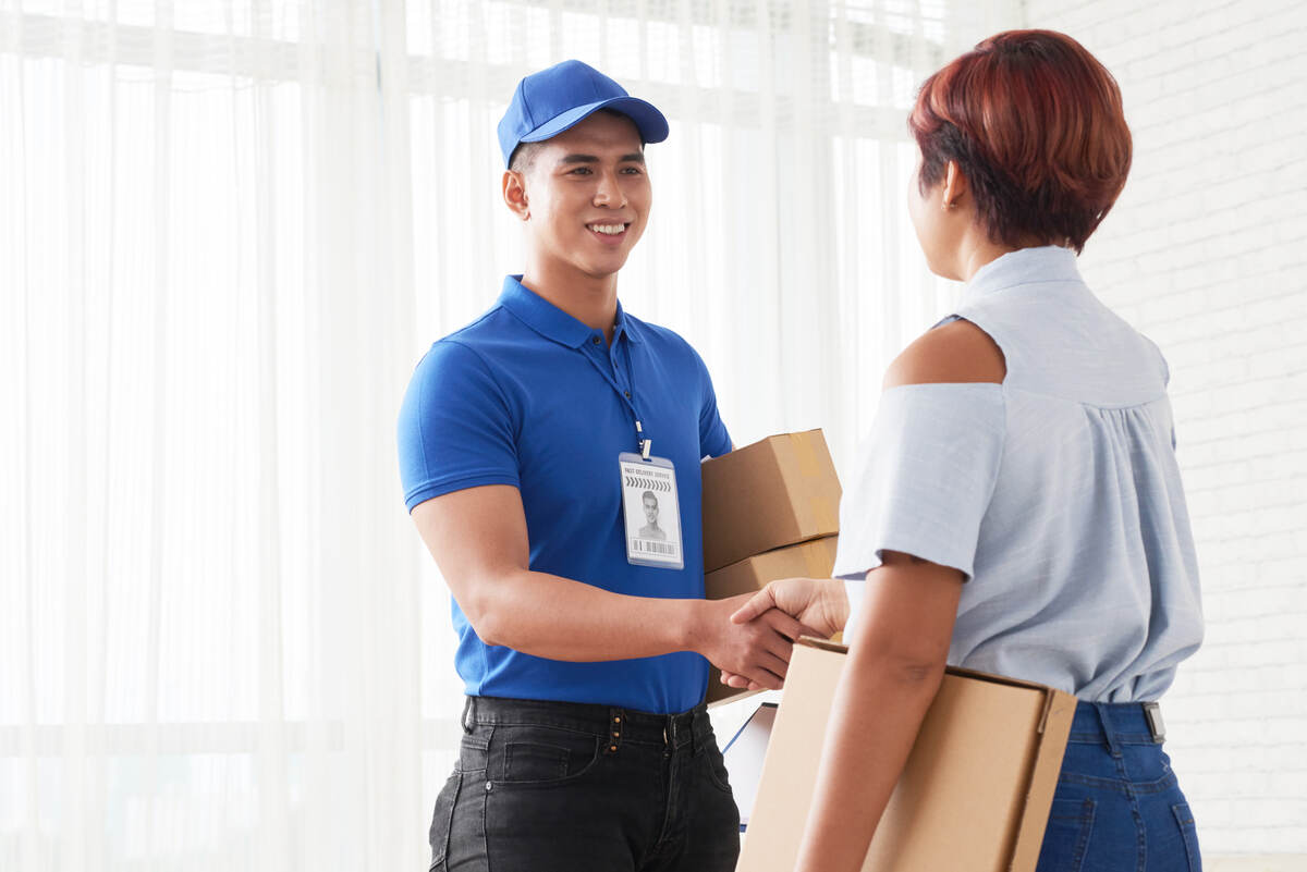 delivery man delivering a package