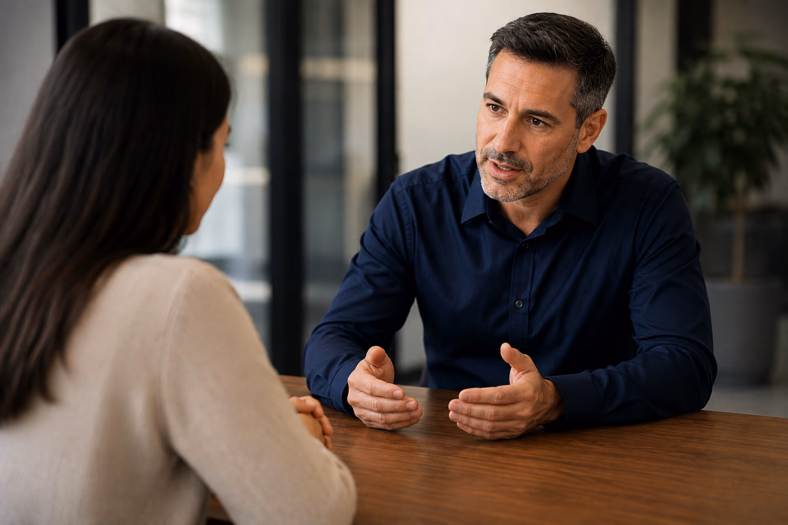 A Unival representative discussing a claim with a client