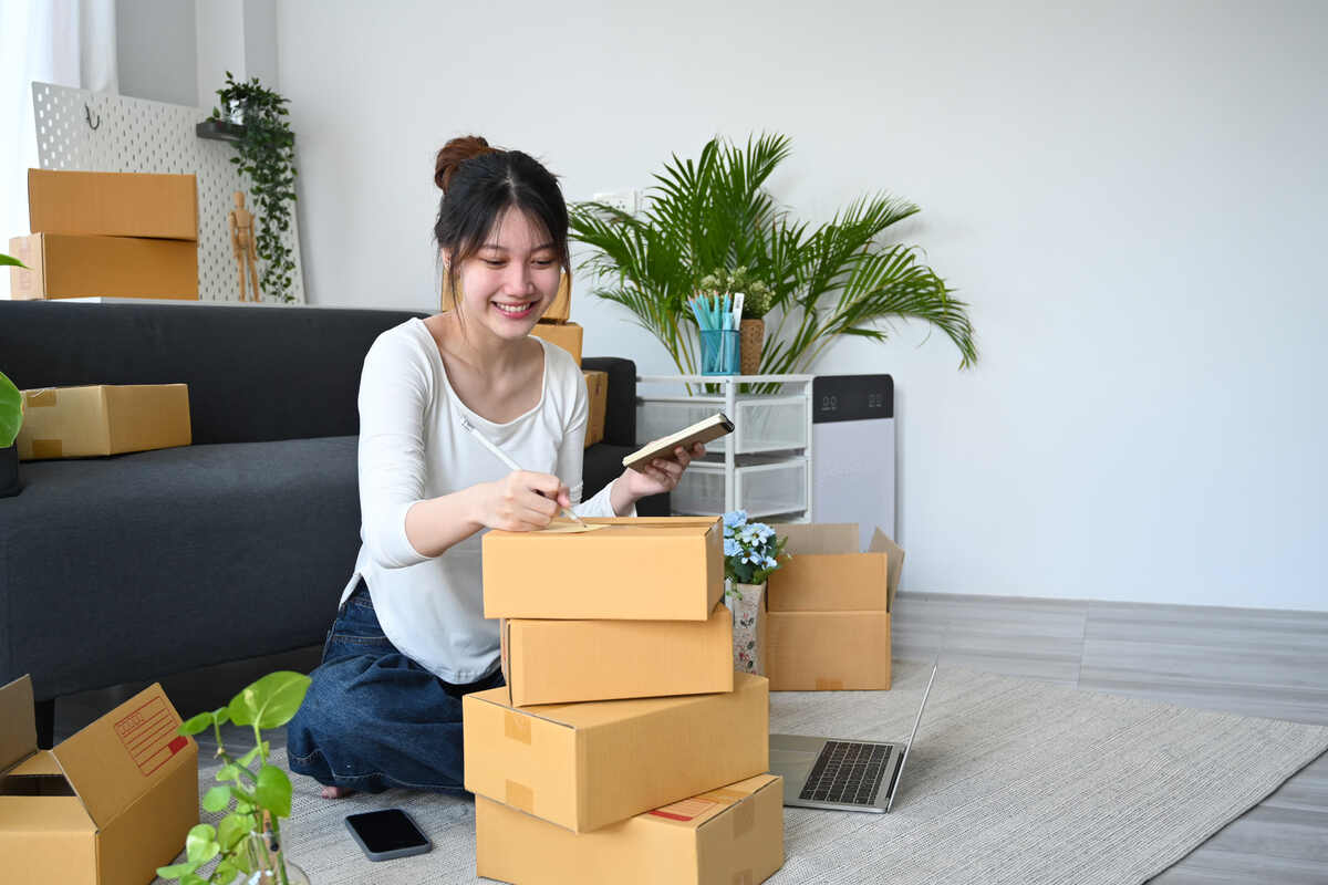 Woman packing a box